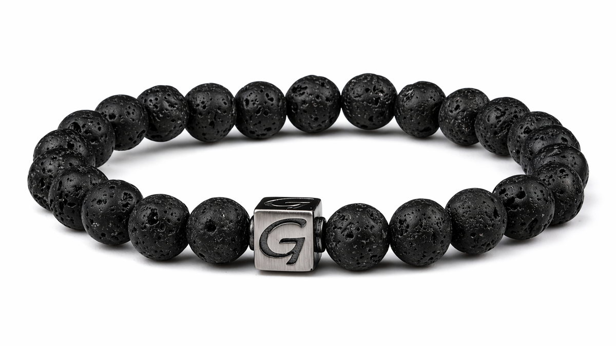 Black Volcanic armband met natuursteen kralen en RVS Logo